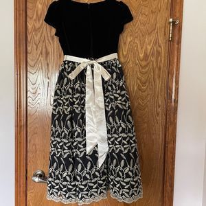 Size 12 girls black & gold dress
